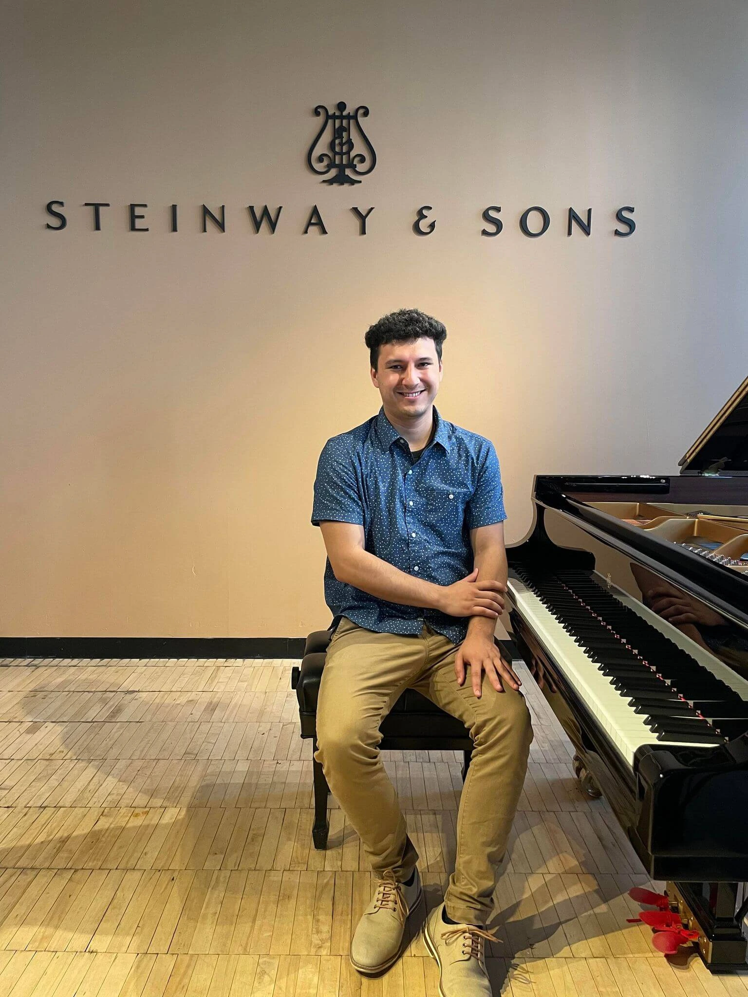 Jimmy Espinoza with a Stienway Piano