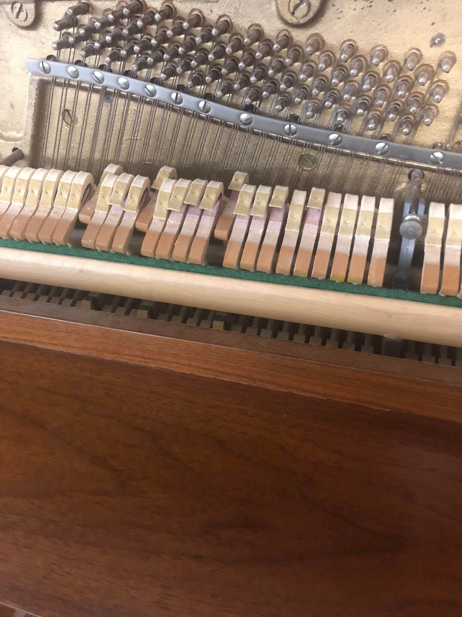 Water damaged piano in need of major repair work